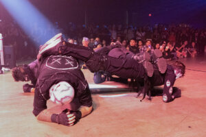 The Decayed Brigade Southern California Sliders position themselves just before fellow sliders leap over them in a high-inensity routine.