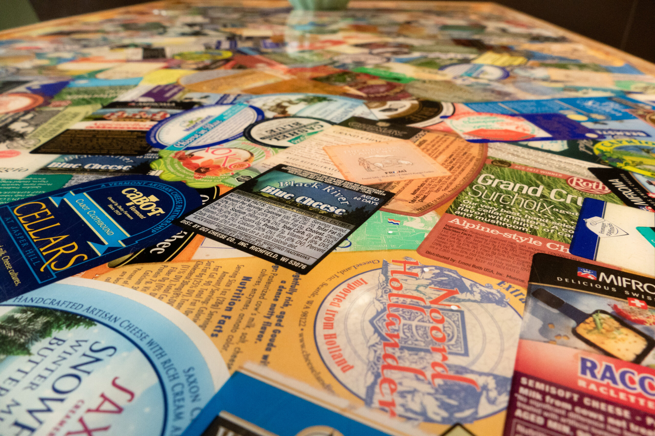 A table displays cheese labels inside The Vintage LBC in Bixby Knolls. 