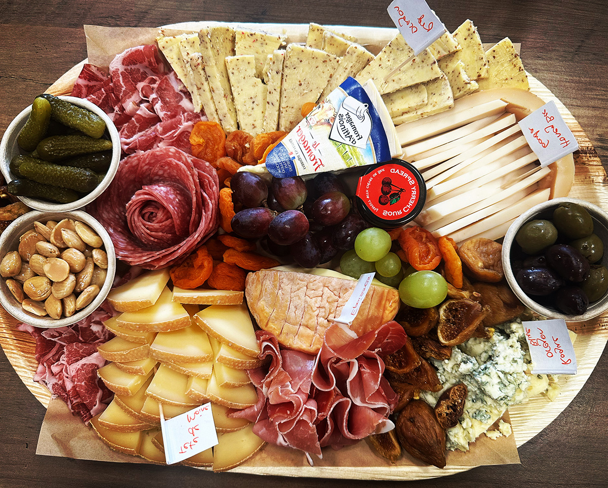 This large charcuterie platter, with a salami rose, was assembled by Vanessa Harmon, owner of The Vintage LBC. 