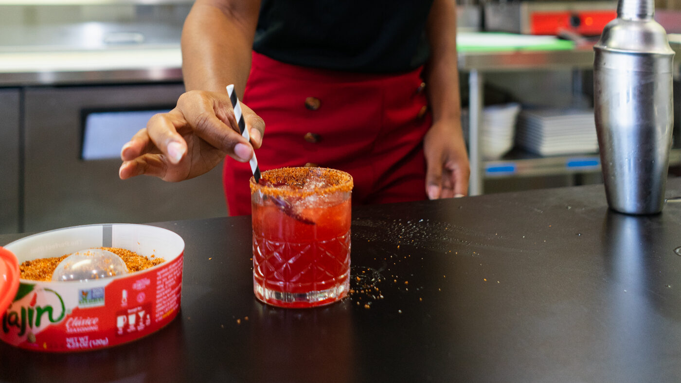 Stephanie Evans makes the La Spicy Shirley mocktail.