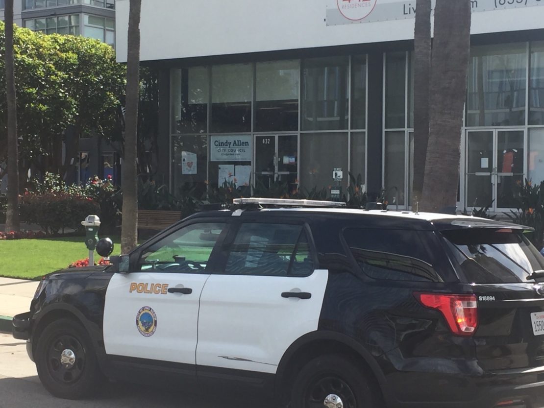 A Long Beach Police Department vehicle is parked in front of the campaign office of 2nd District council candidate Cindy Allen after anti-police protestors demonstrated in front of the building on the morning of Sunday, Feb. 23, 2020. Allen said protestors vandalized her office and violently attempted to open the office door. Photo by Curtis Herod.