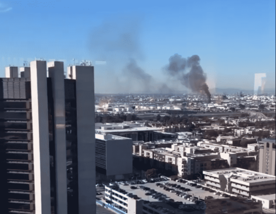 A fire, seen from Downtown, burned a building in West Long Beach Thursday around 1 p.m., sending smoke billowing into the air. Photo courtesy of Sydney Richardson.