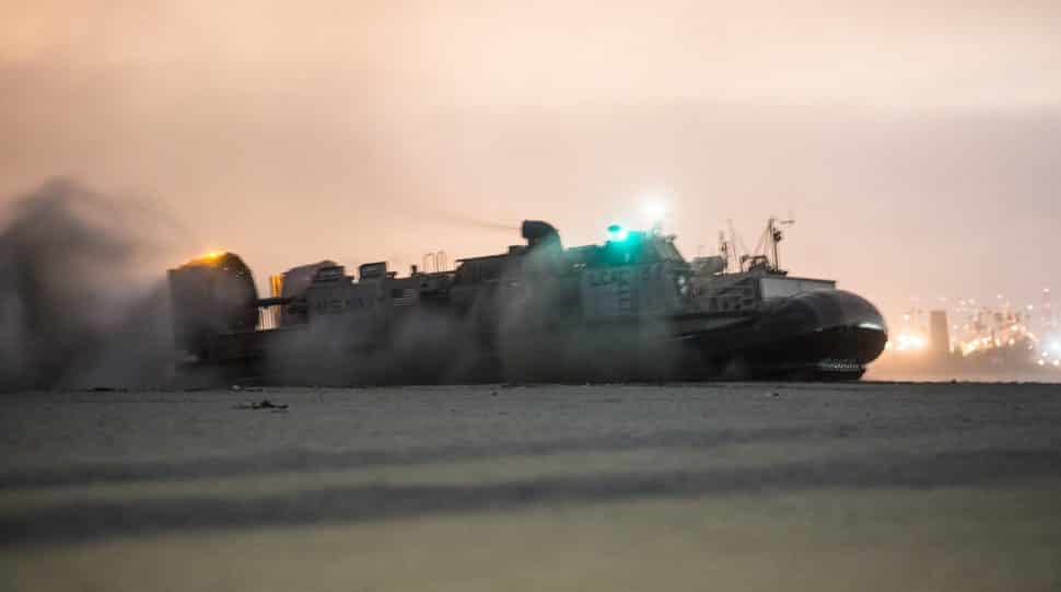 A Marine hovercraft lands on the beaches of Long Beach just after midnight, near Claremont Ave. and Ocean Blvd., as Marines and Sailors from I Marine Expeditionary Force and U.S. Third Fleet conducted a beach landing training exercise. The training is designed to enhance the integration and collective capability of U.S. Marine Corps and Navy forces. Wednesday, Mar. 20, 2019. Photo by Stephen Carr